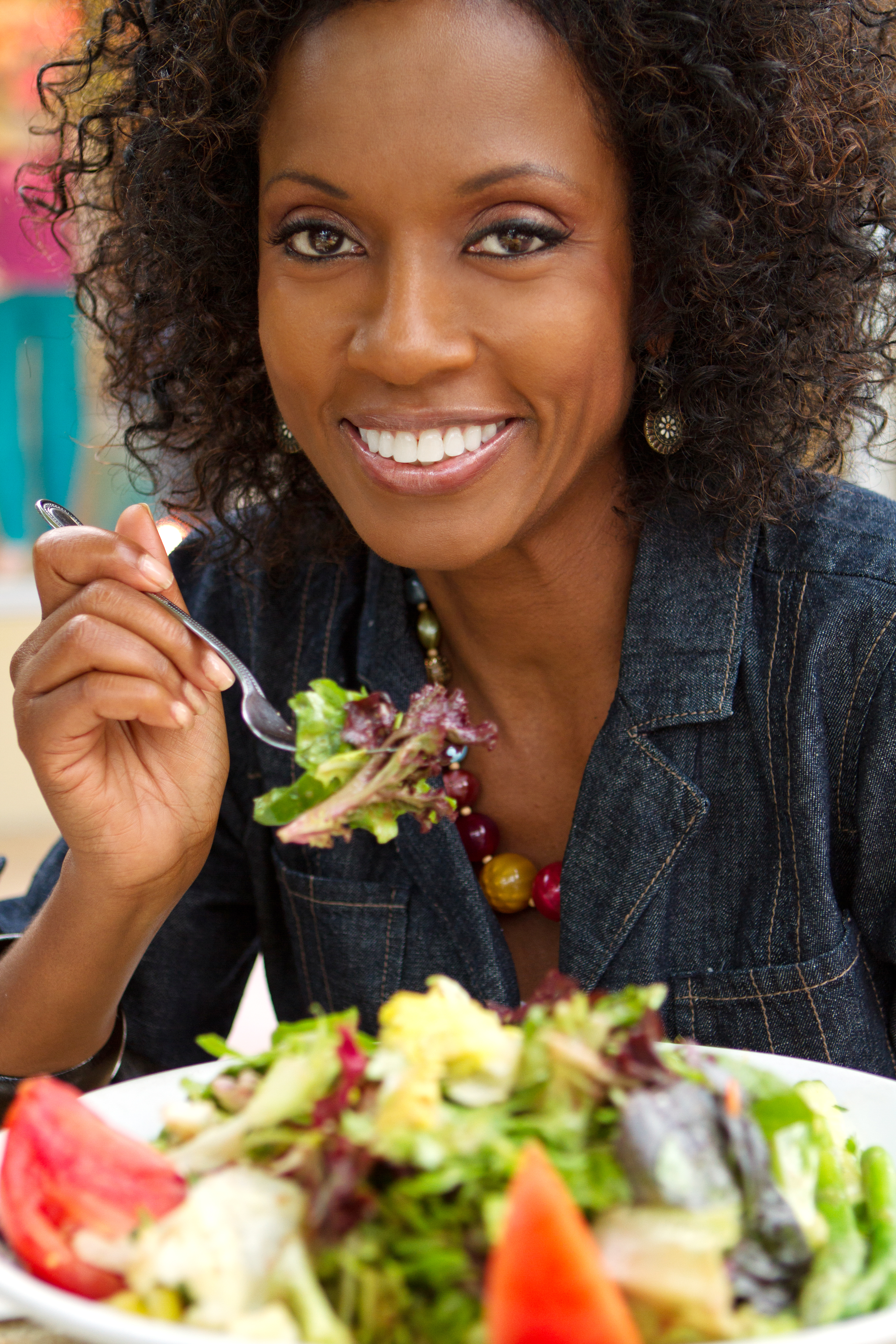 Woman eating salad