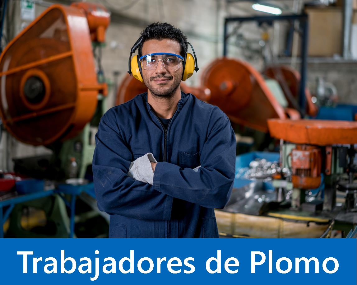 Worker standing in front of factory