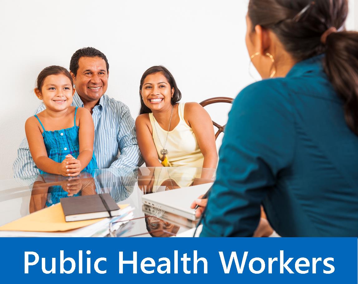 Family sitting at table talking to social worker