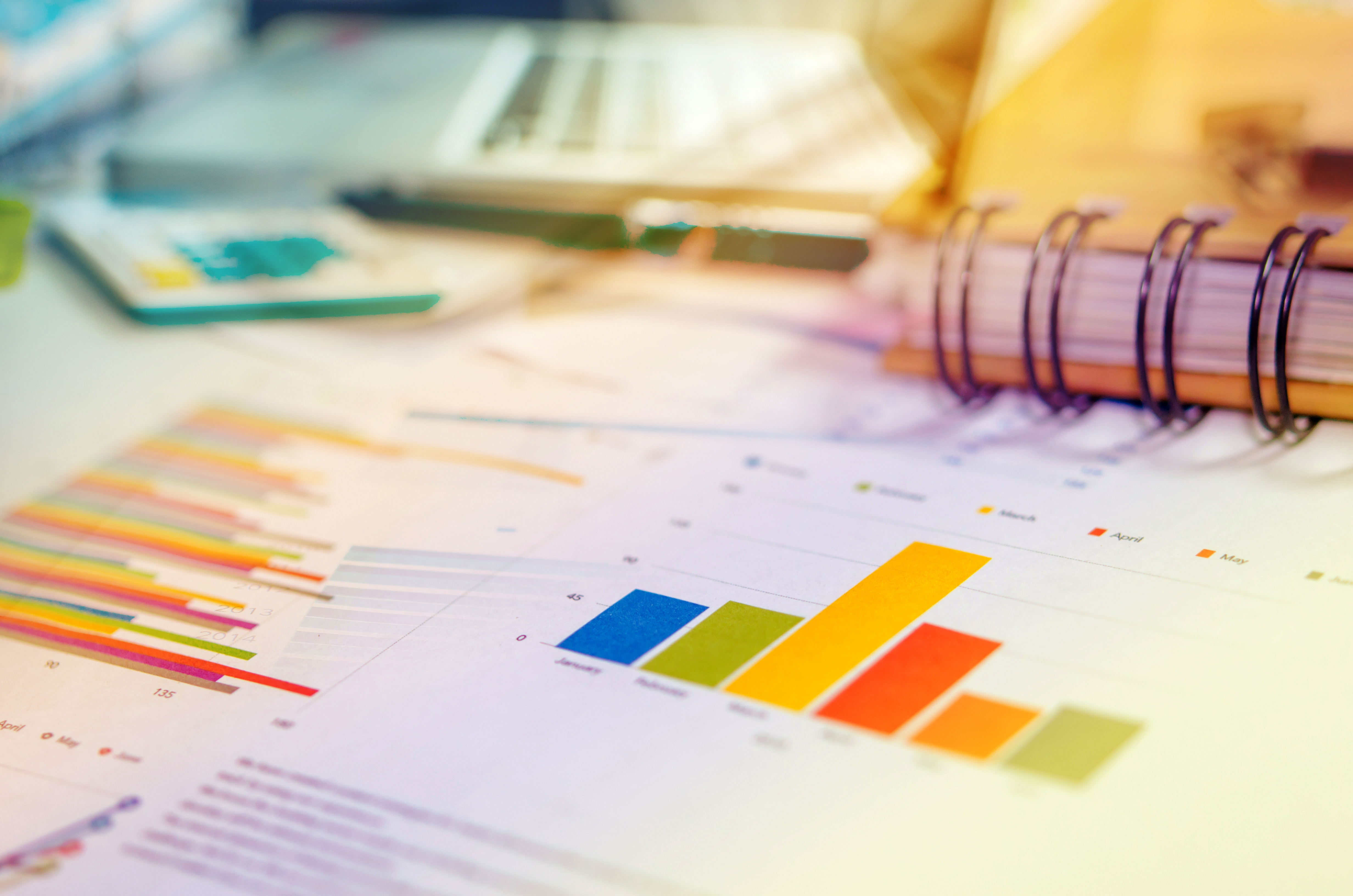 charts scattered across a table