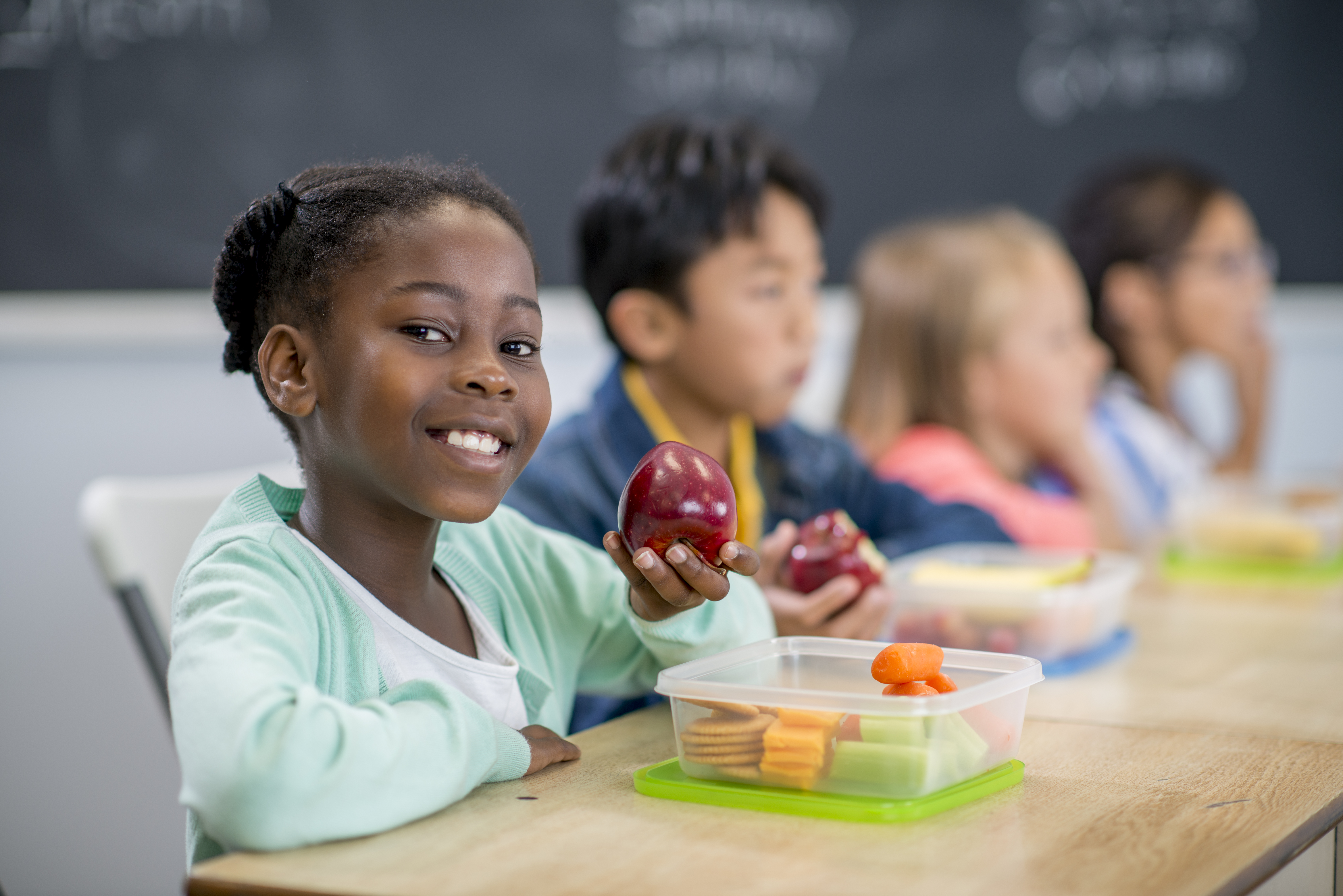 Girl eating lunch at school