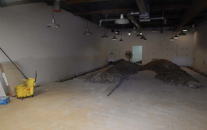 Exhibit 2: Photo of the rear left corner store space where the victim died.