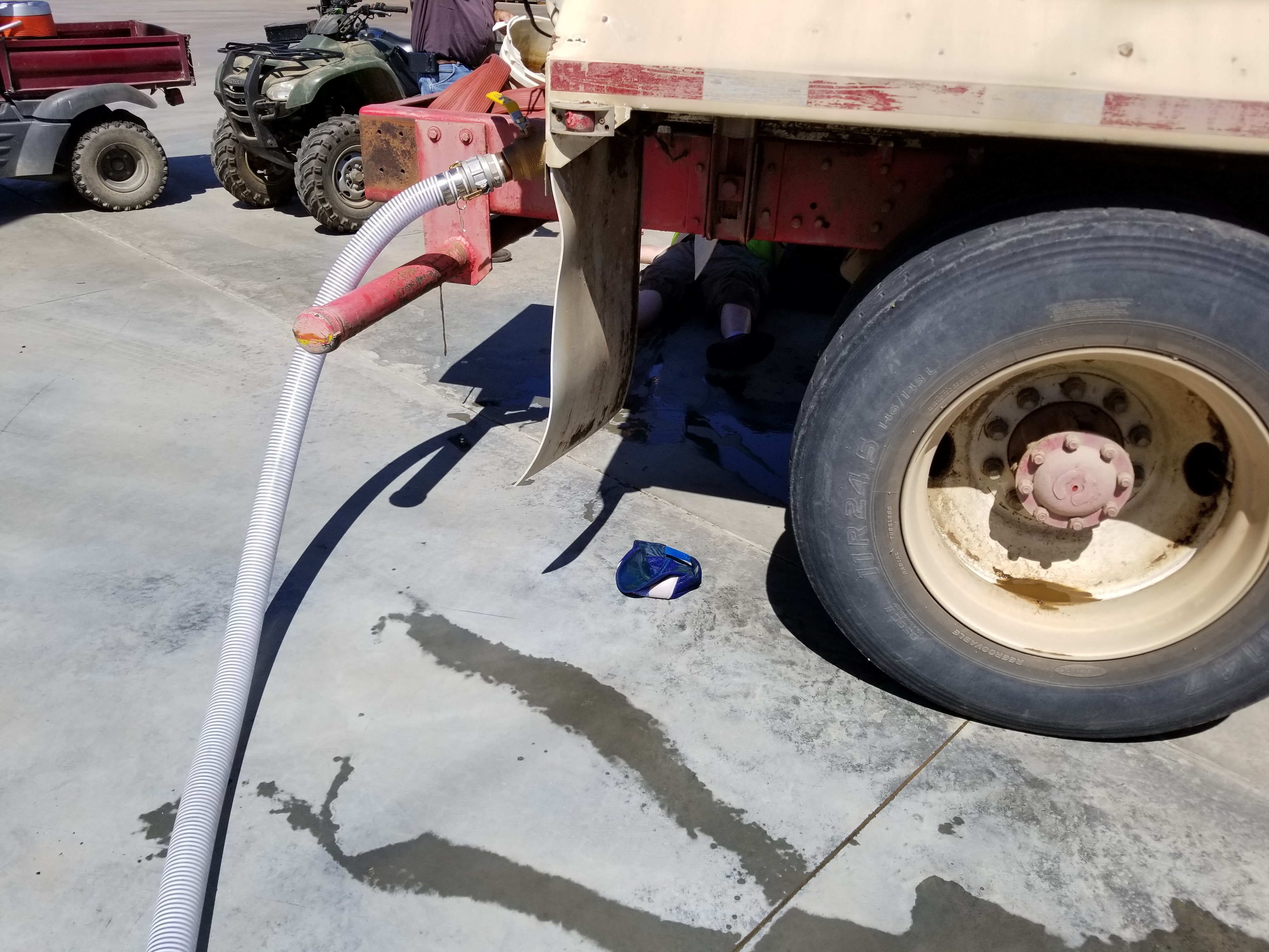 Exhibit 2-Back of water truck with hose attached