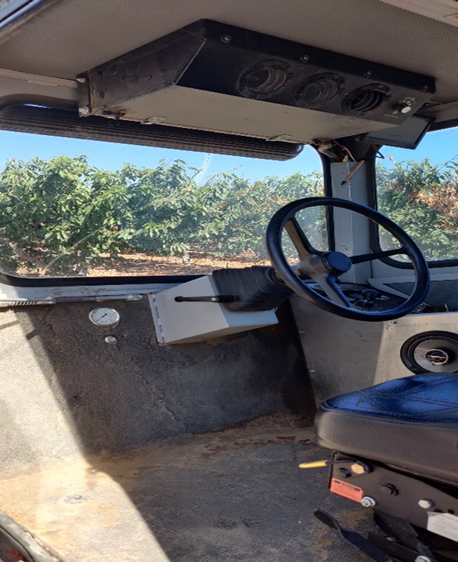 Inside of shredder cab has no warning labels posted
