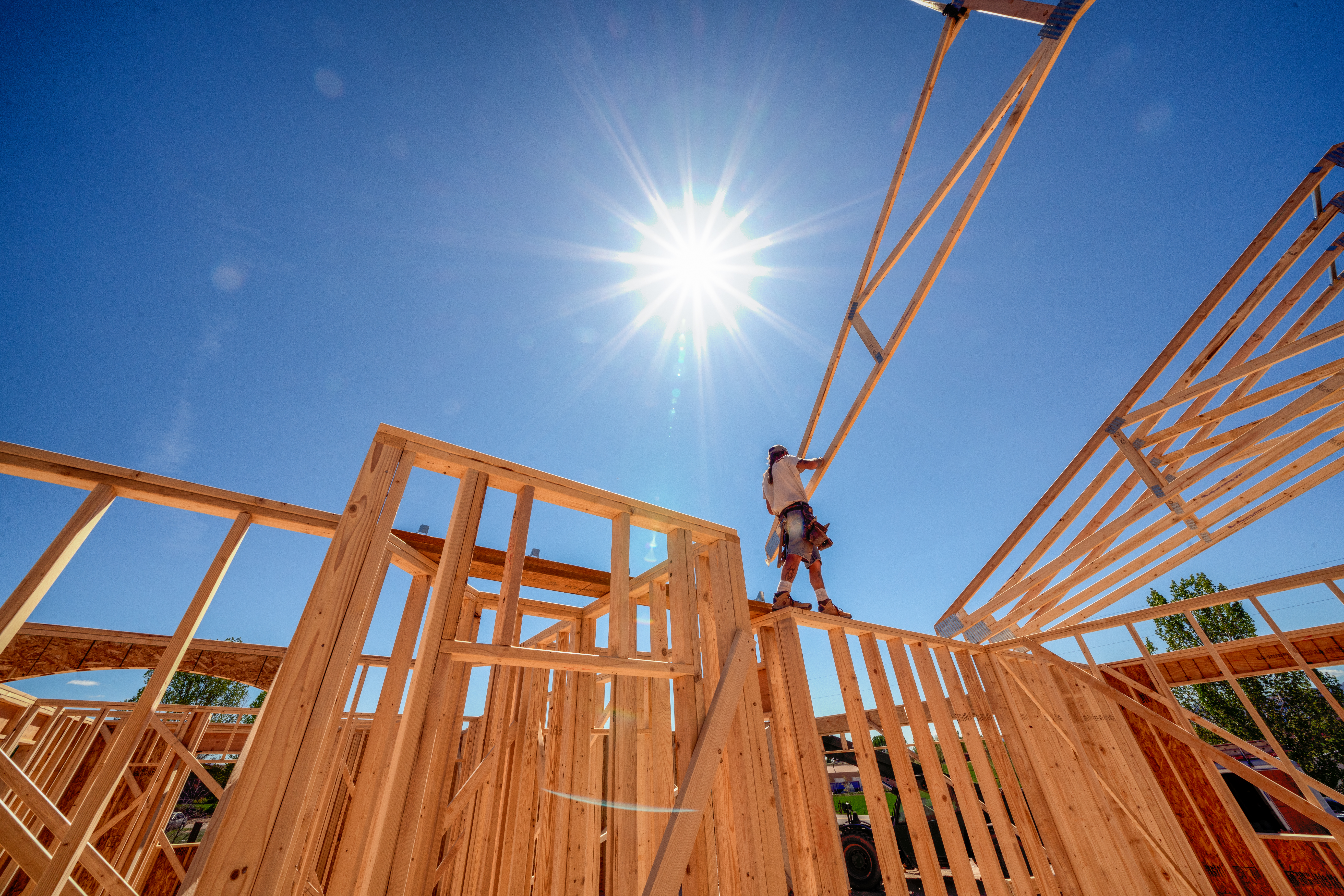 Construction worker on building frame