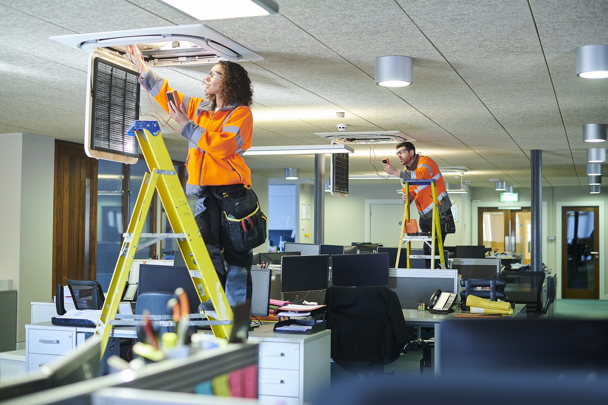Workers checking vent