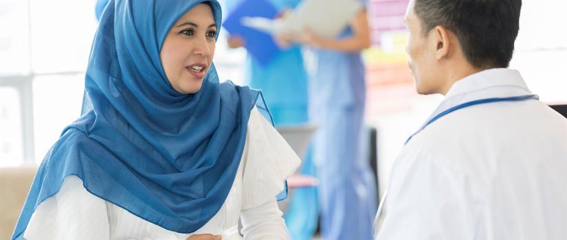 Healthcare provider speaking with patient