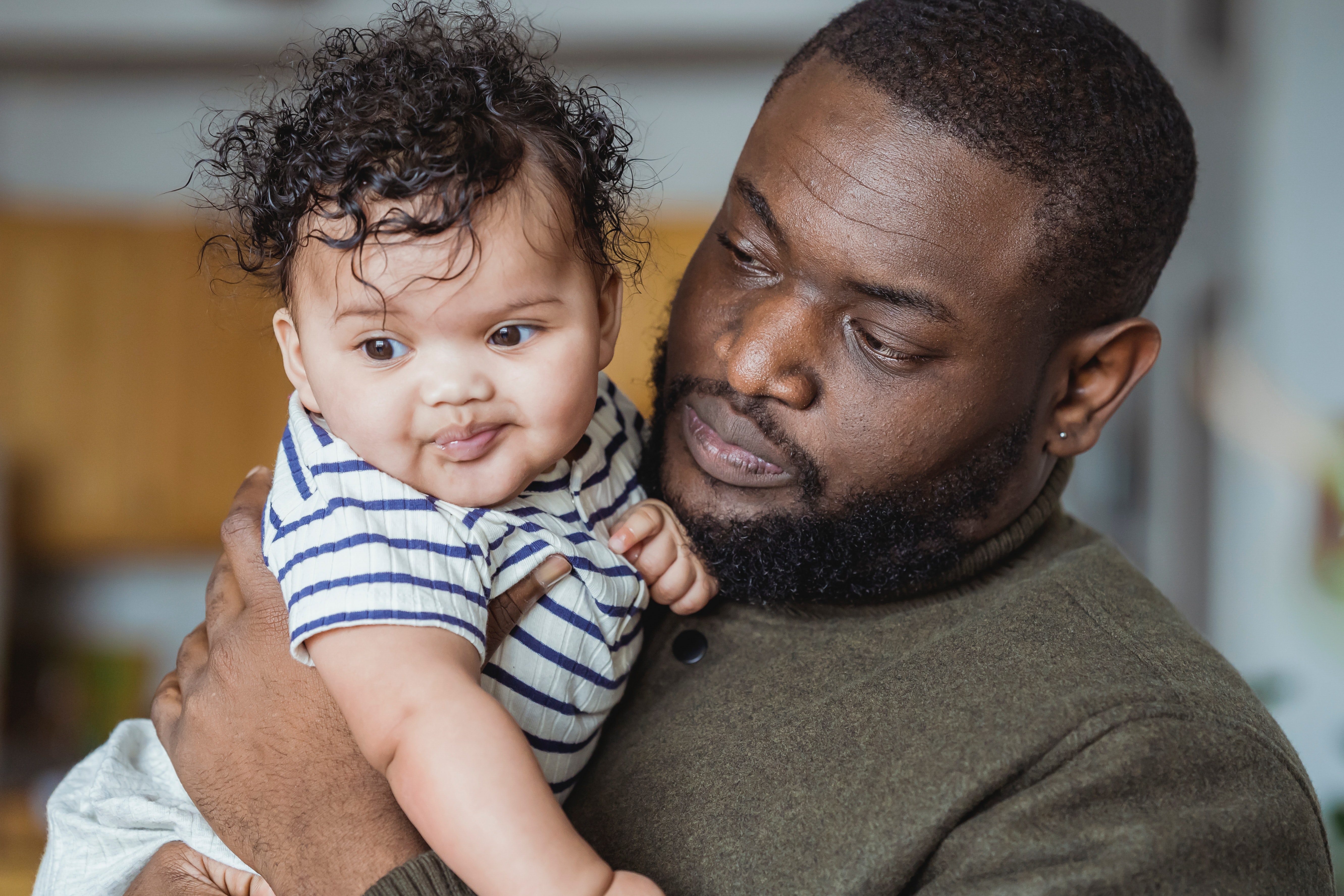 man holding child with cleft lip man holding child with cleft lip