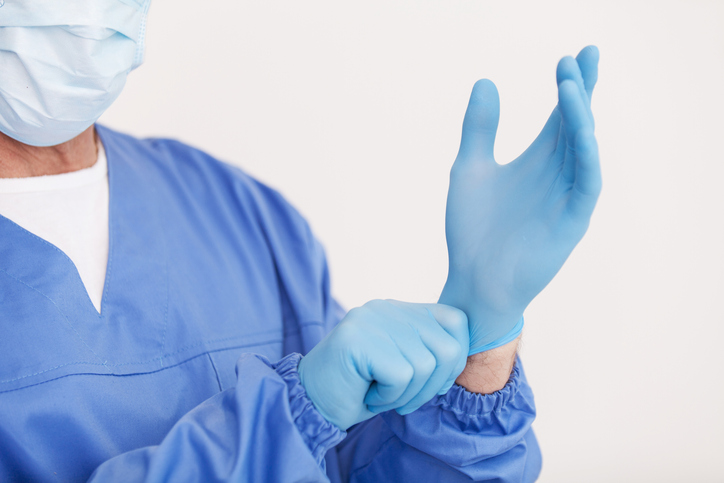 Donning gloves Donning gloves