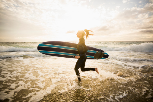 female surfer