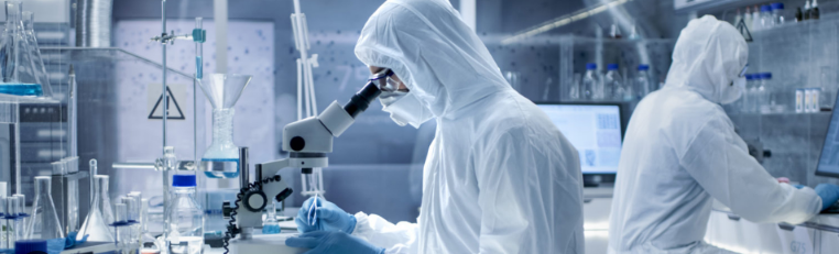 Lab scientists conducting tests and analyzing samples  in a laboratory